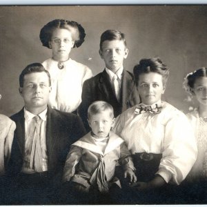 c1910s Charming Large Family of 7 Portrait RPPC Cross Eyed Boy Real Photo A142