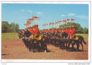 The famed Royal Canadian Mounted Police drilling for the colorful musical rid...