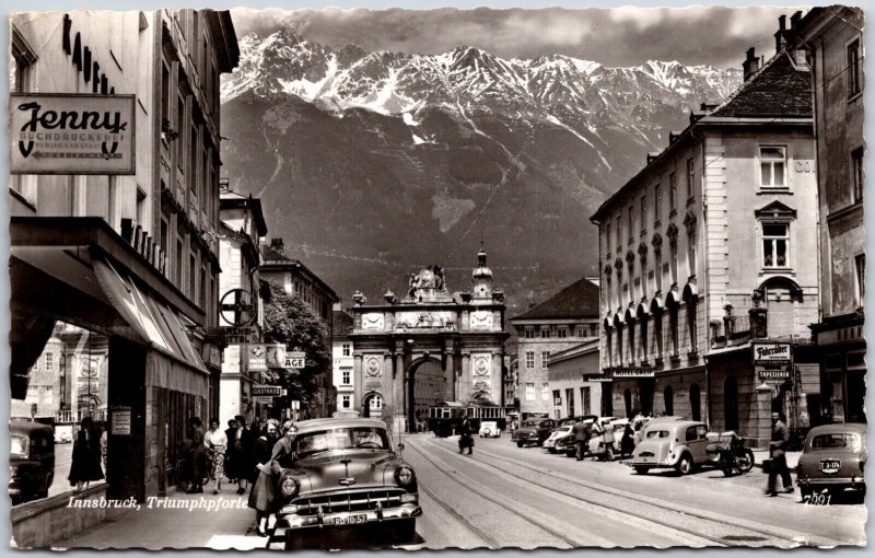 Innsbruck AT Triumphpforte 50s Chevy Buchdruckere Hotel Austria RPPC Postcard