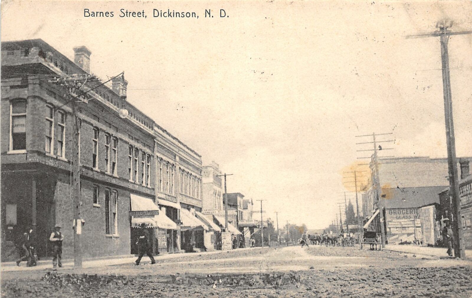 G16/ Dickinson North Dakota Postcard 1907 Barnes Street Stores United