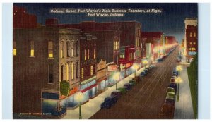 1949 Calhoun Street Fort Wayne's Main Business Thorofare Night Cars IN Postcard 