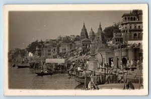 India RPPC Photo Postcard Boat Sailing Crowd Scene Near Varanasi Temple c1940's