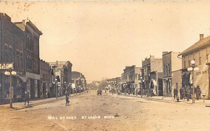 St Louis MI Mill Street Storefronts Horse & Wagons RPPC Postcard