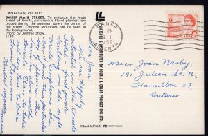 AB BANFF Main Street w/Cascade Mountain in background pm1969old cars 1950s-1970s