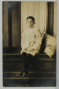 RPPC Cute Young Boy Posing in Window Seat c1900s Real Photo Postcard N15