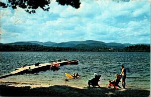 Farrington's on Lake Kezar, Lovell, Maine Postcard beach chairs, swimmers, boats