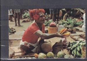 PAPUA, NEW GUINEA, VENDOR SELLING BITTERSWEET STAR FRUIT, BANANAS, c1980 ppc.