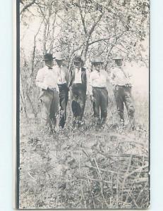 Pre-1918 rppc GROUP OF MEN ALL WEARING HATS UNDER THE TREES HM0170