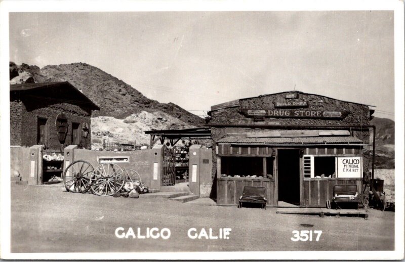 Real Photo Postcard Drug Store and Street Scene Highway 91 in Calico, California 