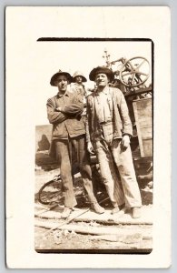 RPPC Cascade WI Men Workers Farmers Equipment Wals Family Postcard P25