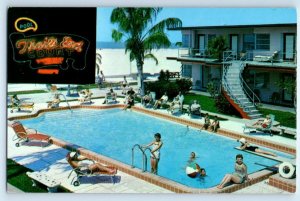 TREASURE ISLAND, St. Petersburg FL~ Roadside TRAILS END MOTEL Pool Neon Postcard