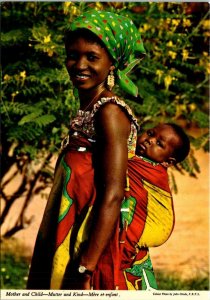 VINTAGE CONTINENTAL SIZE POSTCARD MOTHER AND CHILD MAILED FROM RWANDA 1980 