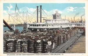 Unloading cotton from Mississippi River steamboats New Orleans, Louisiana, US...