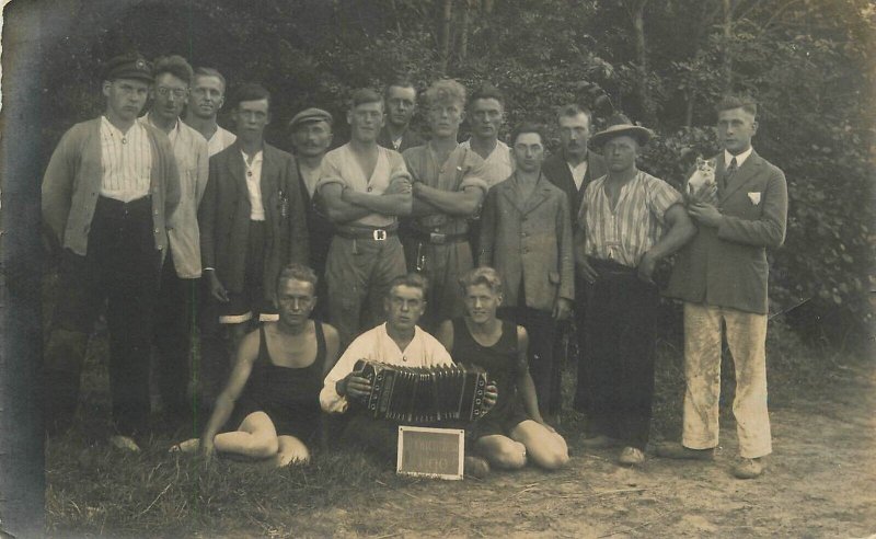 Postcard RPPC Photo 1920s Europe group of men Concertina Music Kitten 22-12646