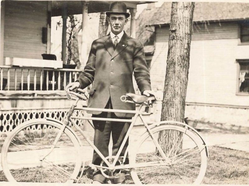 OWOSSO MICHIGAN~PROUD MAN WITH BICYCLE~1910s REAL PHOTO