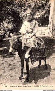 Girl Riding Donkey