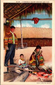 Postcard Florida Native Americana A Seminole Squaw Smoking Gar Fish 1940s V75