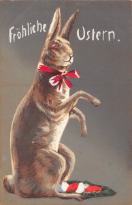 Easter Greetings Humanized Rabbit with Ribbon Eggs vintage postcard C318