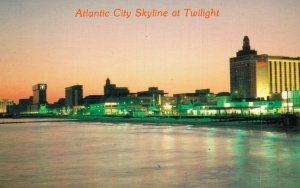 USA Atlantic City Skyline at Twilight Vintage Postcard 07.46