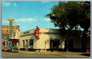 Postcard Brandon Manitoba c1963 Greyhound Bus Depot Maxwell House Grill Cars