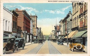 J50/ Zanesville Ohio Postcard c1920s Main Street Stores Automobiles 102