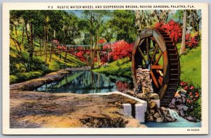 Vtg Palatka FL Rustic Water Wheel Suspension Bridge Ravine Gardens View Postcard