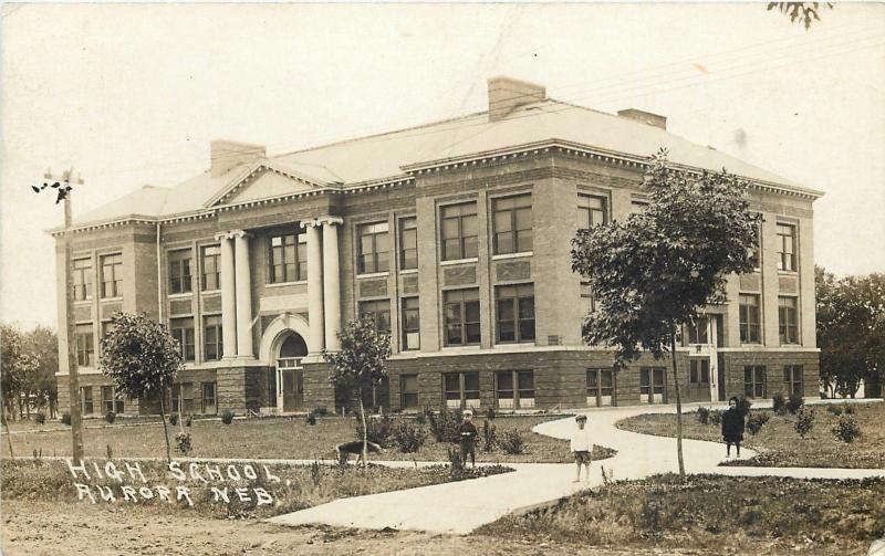 Aurora Nebraska~High School~Little KIds on Sidewalk~Dog By Tree~1920 RPPC 