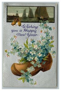 Vintage 1908 International Art New Year Postcard Silver Face Wooden Shoes Flower