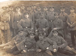 Soldiers in Uniform Military Writing on Back 