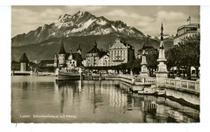 Switzerland - Luzern. The Pier with Mt. Pilatus  RPPC  (curled postcard)