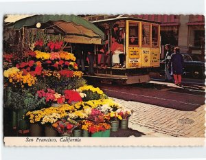 Postcard Cable cars and colorful flower stands, San Francisco, California