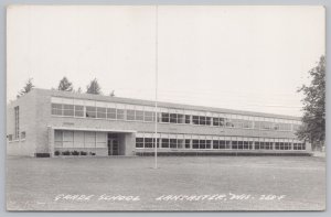 Real Photo Postcard~Front View Of Grade School~Lancaster Wisconsin~L L Cook Co