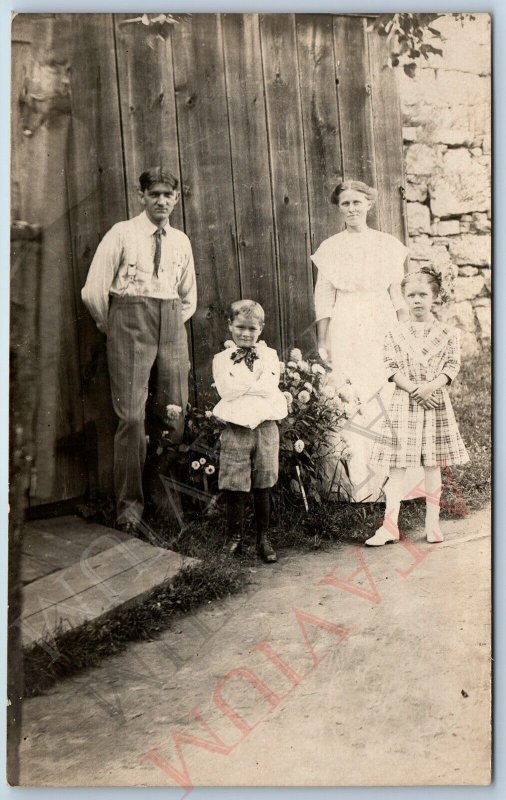 c1910s Lovely Family Outdoors RPPC Handsome Boy Father Girl Mother Photo A174