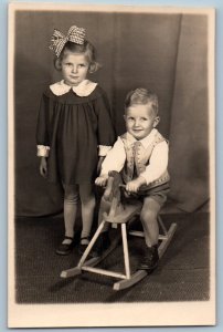 Slovakia Postcard RPPC Photo Little Kids Rocking Horse Toy Studio c1910's Posted