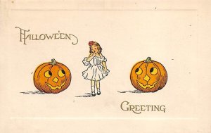 2 pumpkins Halloween writing on back 