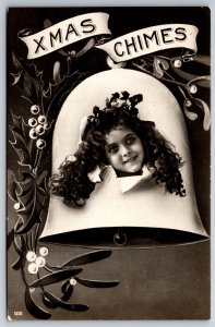 Christmas Chimes~Girl's Head Breaks Thru Bell~Holly~Samson Bros~1917 RPPC