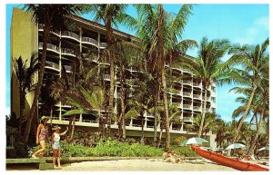 Surf Rider Hotel Guests Lay Under Umbrellas Outrigger on Sand Hawaii Postcard