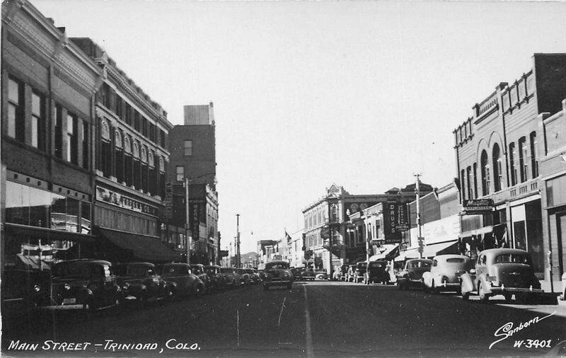 Autos Main Street Trinidad Colorado 1940s Sanborn RPPC Photo Postcard 4380