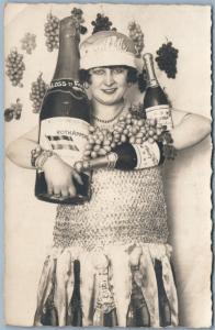 ANTIQUE REAL PHOTO PHOTOMONTAGE POSTCARD RPPC GIRL w/ CHAMPAIGNE BOTTLES collage