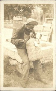 Black Americana Man w/ Old Jug Whiskey? Water Well? Real Photo Postcard c1910