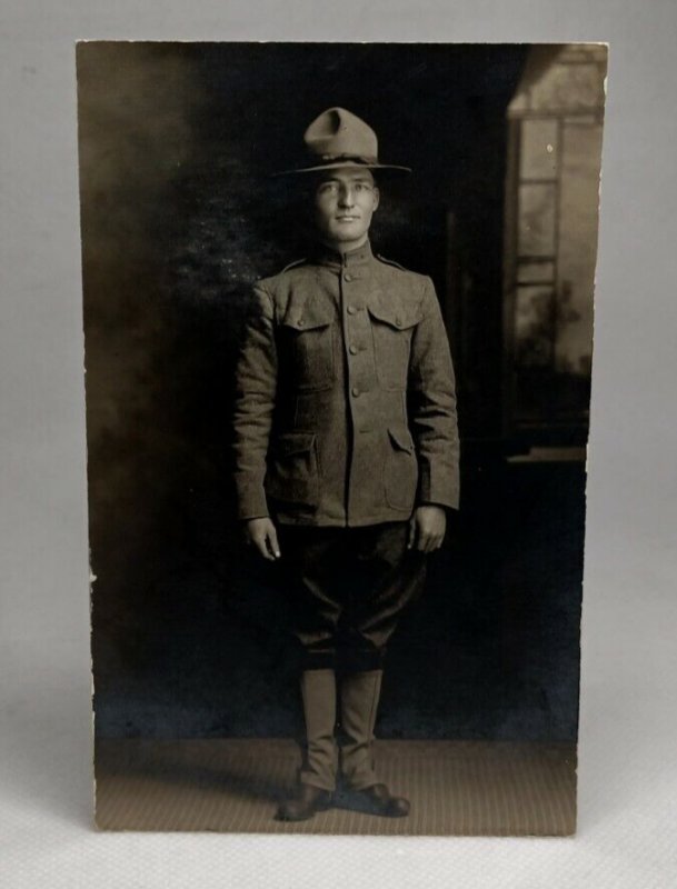 RPPC World War 1 Soldier In Dress Uniform Posing In Studio AZO postcard...