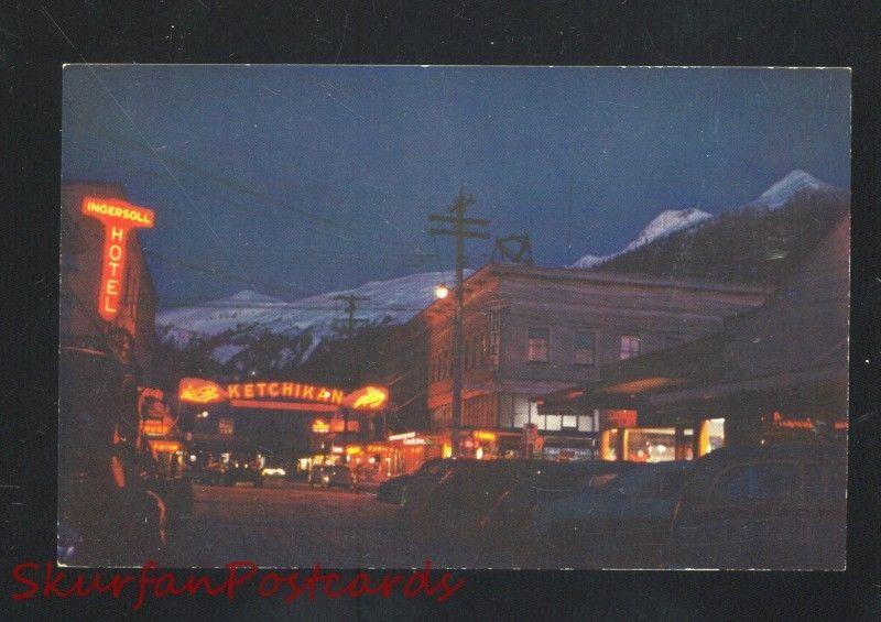 KETCHIKAN ALASKA DOWNTOWN STREET SCENE AT NIGHT VINTAGE POSTCARD OLD CARS