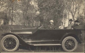 Woman Driver Scowling Young Girl Antique Classic Car Antique RPPC
