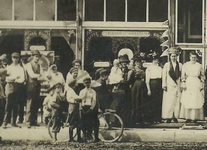 Aneta NORTH DAKOTA RPPC c1910 GENERAL STORE Give-away FREE COFFEE Range Exhibit