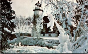 Poscard MI Eagle Harbor LightHouse in winter