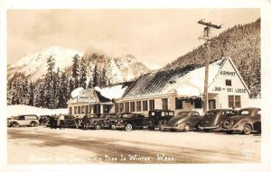 RPPC SUMMIT INN SNOQUALMIE PASS IN WINTER WASHINGTON REAL PHOTO POSTCARD (1940s)