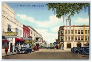 c1940 Marion Street Classic Cars Buildings Shops Road Lake City Florida Postcard