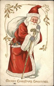 Tuck Christmas Santa Claus with Cane and Toys Embossed c1910 Postcard