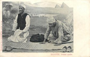 Egypt Arab types in pray old postcard