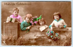 1910's RPPC CONGRATULATIONS HARTELIJK GEFELICITEERD 4 CHILDREN DUTCH POSTCARD